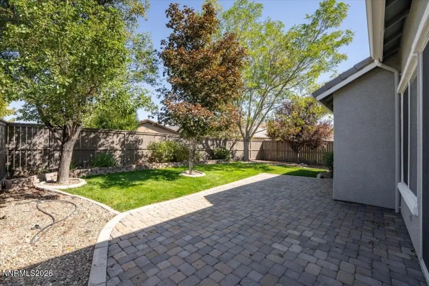 Fully landscaped, backyard with automatic strinklers